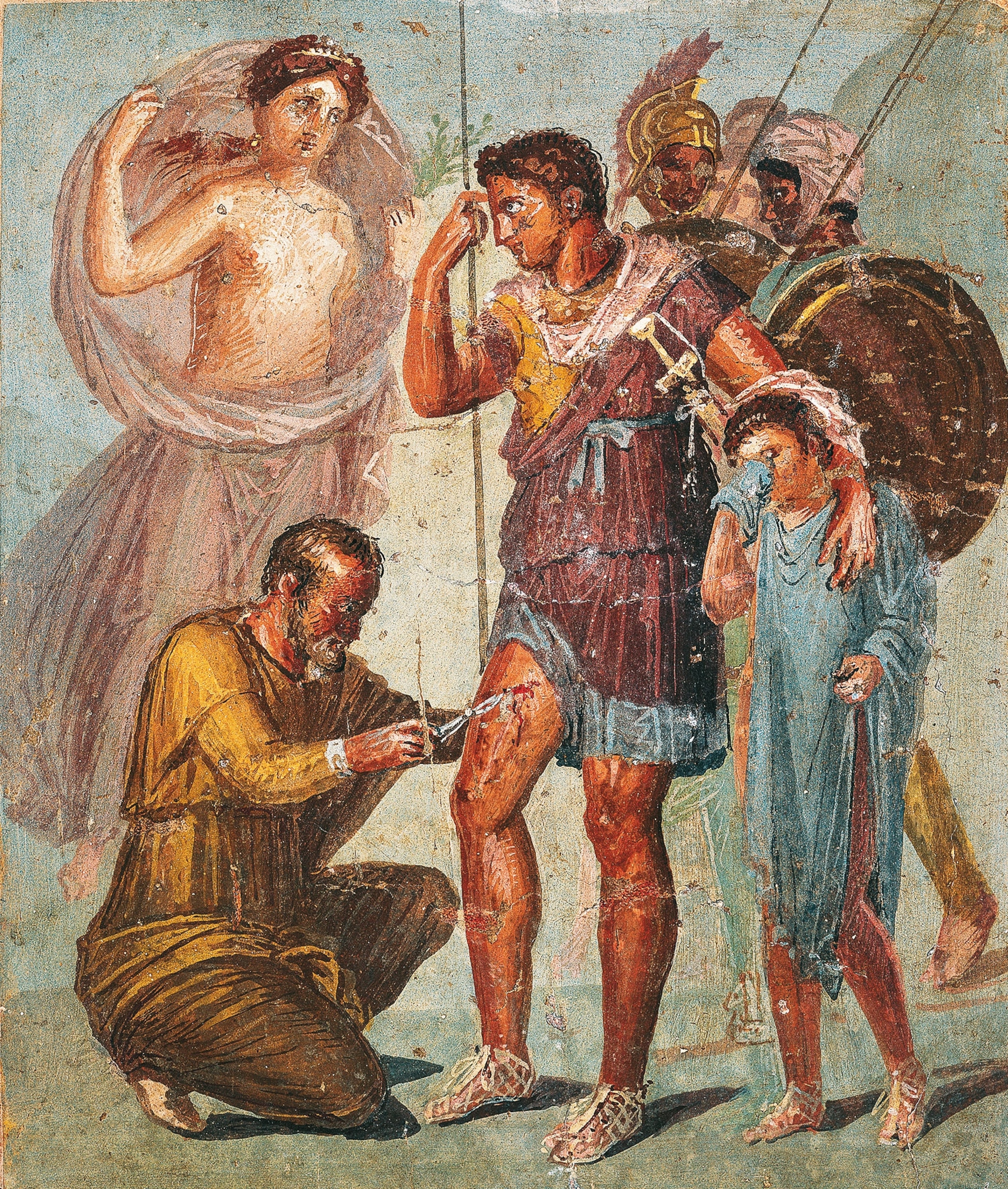 A soldier is being treated for a wound to his thigh, surrounded by others including his concerned mother, in a painting