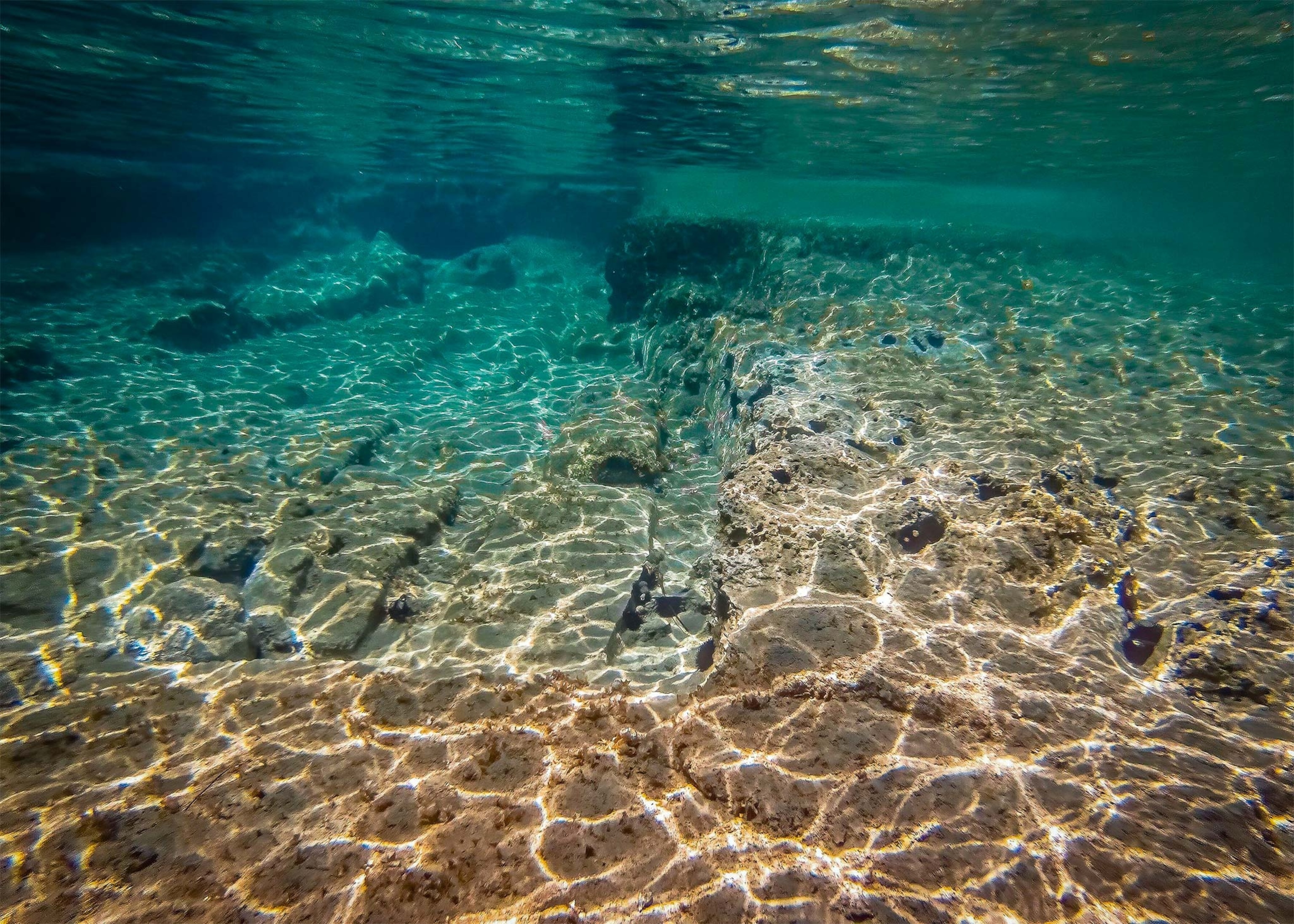 An underwater view of sunken ruins