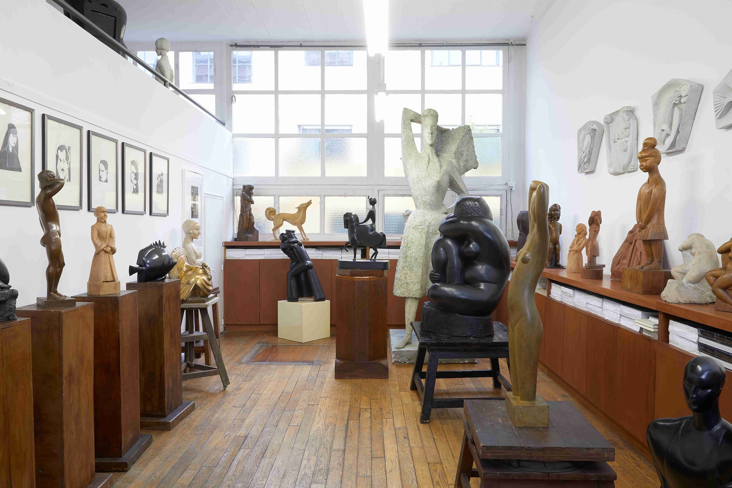 An exhibition room filled with sculptures.