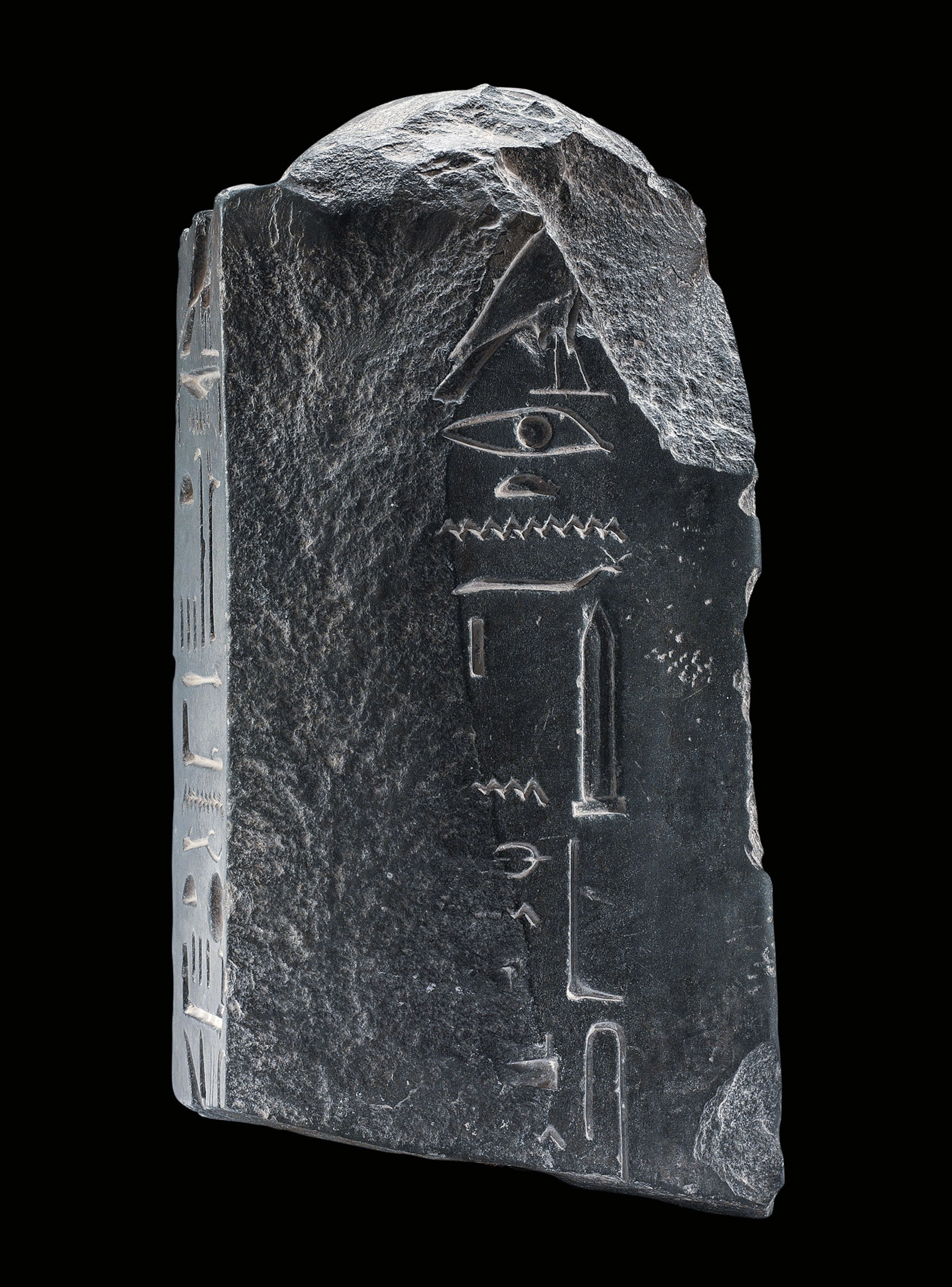 A fragment of an obelisk sculpted from graywacke sandstone