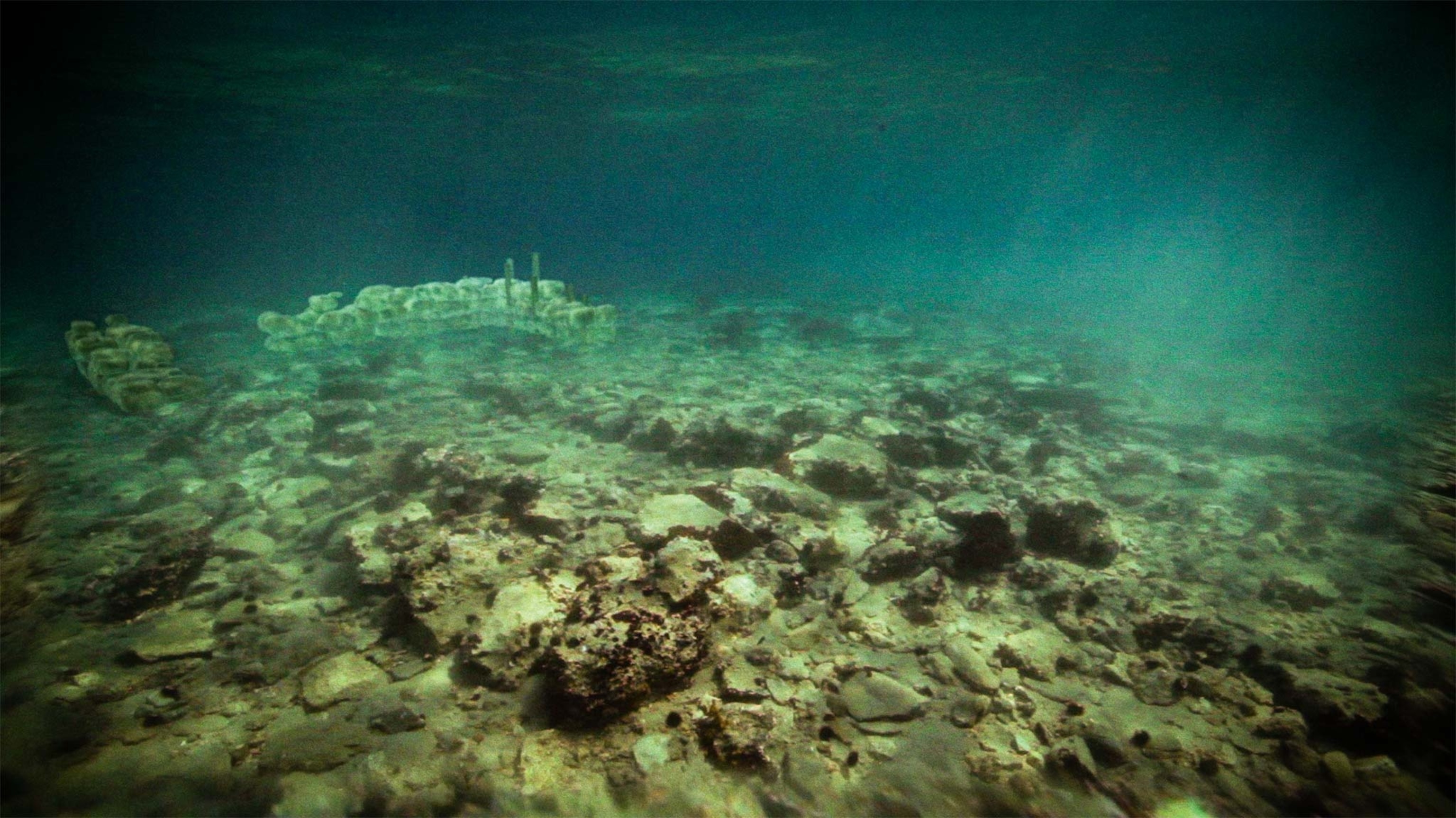 A view of stone foundation ruins underwater