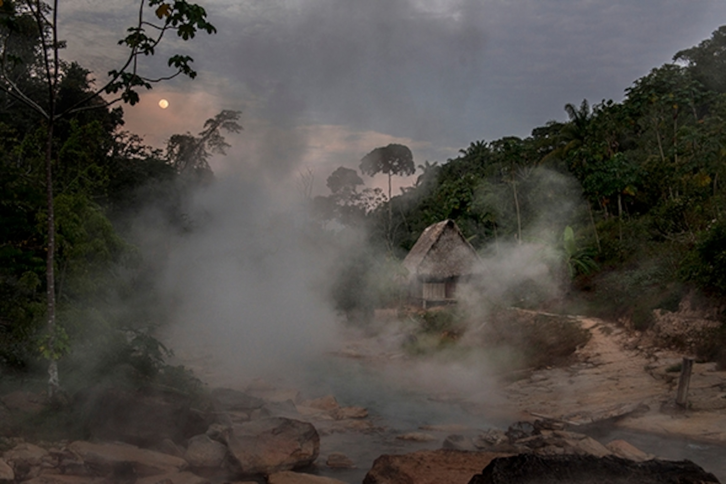 The Boiling River is at the center of life of Mayantuyacu—essential as a source of water, cooking, cleaning, making medicines, even telling time. At the Boiling River, you regularly hear locals refer to “la hora del vapor” (“the vapor hour”). It refers to the end of the day before nightfall, when cooler air temperatures create great plumes of vapor rising up from the river. “La hora del vapor” is a time of relaxation, meditation, and even enjoying the natural sauna; Photograph by Devlin Gandy  