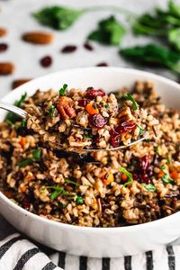 Our easy and beautiful Wild Rice Pilaf is loaded with veggies, crunchy pecans, craisins, and parsley and tastes as good as it looks.