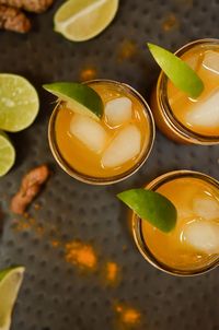 This refreshing Turmeric Gin and Ginger Cocktail features turmeric, ginger beer and gin, delivering loads of health benefits in a tasty libation.