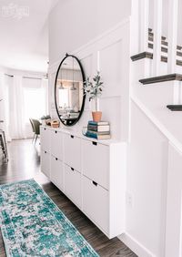 Small Entryway Makeover in a narrow hallway using Ikea Stall shoe storage and DIY board & batten