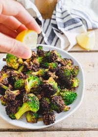 No more mushy frozen broccoli! This air fryer frozen broccoli recipe results in crispy seasoned broccoli florets you'll love!