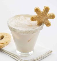 Sugar Cookie Cocktail is an alcoholic beverage with a buttercream rimmed glass filled with vodka, Baileys Irish Cream, and more heavy cream.