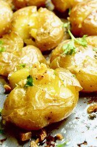 Smashed Lemon Garlic potatoes crusty crunchy on the outside, creamy inside bursting with fresh herb flavors.  A show stopping potato side dish for entertaining!