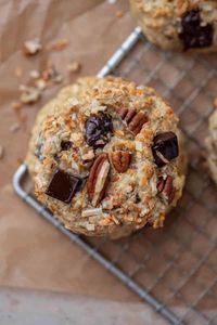 These better than Crumbl cowboy cookies are delicious oat, pecan, chocolate chunk, and coconut cookies. Yielding a soft and chewy cookie.