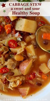 A super healthy recipe for cabbage stew. Loaded with vegetables, unique with sauerkraut, and made sweet with raisins, and honey.  A sweet and sour cabbage, tomato, vegetable, potato soup.  And don't you dare forget to finish this beautiful entree soup with a dollop of sour cream. Hearty and flavor packed, this is a unique Russian Soup Recipe. #recipe #vegetarian #comfortfood #russianfood #vegetariansoup