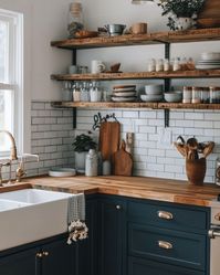 🖤 Dark Boho Kitchen Dreams: Where Edgar Allan Poe Meets Morticia Addams 🍳 Transforming my tiny kitchen into a moody culinary wonderland! Picture this: * Dramatic black cabinets with gleaming brass accents * Classic New York subway tiles for that urban edge * Open shelves showcasing my eclectic collection - glass skulls rubbing elbows with vintage lab beakers 🧪💀 * Shimmering copper pots ready for witchy brews (or just really good pasta) * Lush greenery breathing life into every corner 🌿 It’s a...