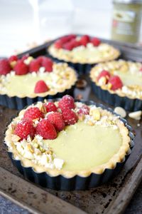 mini raspberry pistachio tartlets - The Baking Fairy