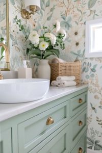 Transform your bathroom with shades of green. Get inspired by emerald, olive, and sage designs for your vanity and cabinets. Over 40 beautiful images to explore including wallpaper!