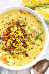 Easy corn chowder recipe with a classic combination of aromatic vegetables, sweet corn, chunks of tender potatoes, and smokey bacon. #cornchowder #corn #soup via @foodiegavin