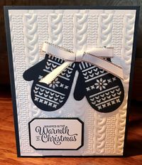 Stampin Up Smitten Mittens Thinlits In Night Of Navy layered on Cable Embossing Folder. Sentiment from Timeless Tidings.