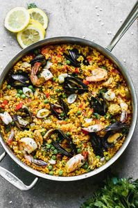 You can make a delicious, authentic Paella--the most popular dish of Spain--in your own kitchen with simple ingredients like rice, saffron, vegetables, chicken, and seafood.