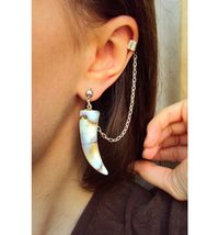 This unusual canine tooth ear cuff set I made for a person who likes unusual jewelry! It's a great gift idea and amulet for a hunter or unusual jewelry lover. This cuff set is lightweight, stylish and one size fits all. Gorgeous, stunning and original jewelry for your outlook! The upper part of the cuff is fake, no need a piercing. Each faux fang charm is decorated with an ornament at tribal style.  The size of the tooth charm is approx. 1,5 x 0,5 in. * Every faux fang charm is unique so the act