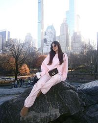 Central Park outfit inspo | Central Park photo inspo | Central Park pic inspo | Central Park | NYC | winter | christmas | buildings | girl in pink | pink outfit | fendi bag | ugg outfit inspo | new york city | fashion | house of cb | miu miu | sunglasses