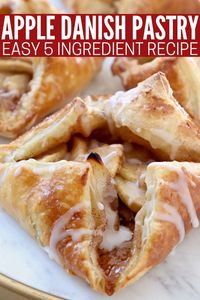 Make a delicious Apple Danish Pastry with this easy 5 ingredient recipe! Puff pastry dough, apple pie filling and powdered sugar icing are combined in this recipe for a scrumptious breakfast, brunch or dessert!