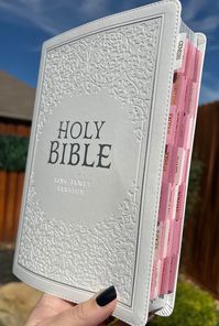 BEST SELLER Celebrate the sacraments, rites and ceremonies of the Church with the White Faux Leather Large Print Thinline KJV Bible with Ombré tabs! Whether you are celebrating a baptism, confirmation, church membership, first communion, christening, or wedding, the pure white KJV Bible will mark your rite of passage in a meaningful and memorable way.   (I started making these bibles to help pay for my husband's tremendous medical bills after suffering a brain aneurysm. 100% of each sale goes to