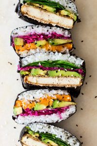 Onigirazu also known as a sushi sandwich is a great way to enjoy your sushi on the go. Our version has a vegan filling of katsu tofu and sweet potato.