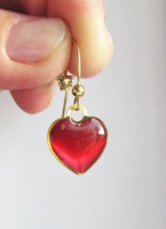 Sweet, lovely and cute earrings. The total length of the earrings: 3,3 cm Hearts are covered with red resin. The earring pendants are made of gold-plated silver. Red Hearts, Christmas 2024, Jewelry Rings Engagement, Gold Plated Silver, Cute Earrings, Red Heart, Red Gold, Hippie Boho, Jewelry Earrings Dangle