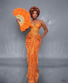 Become a showstopper in this stunning number!  Hand fan and head gear (gele) sold differently.  Please note that custom/luxury dresses cannot be returned or exchanged. All sales are final! ‼️MEASUREMENTS REQUIRED ‼️ Burst Hips  Waist Dress length  Sleeve length  Under burst Shoulder  Please note that the exact fabric might not be available and we will provide similar options  Made with 100% lace Care: Hand wash. Do not bleach Feel free to start a chat for any enquiry. Thanks for visiting. Luxury Red Sets For Traditional Ceremonies, Traditional Laos Wedding Dress, Yellow Ball Gown For Wedding, Orange Floor-length Evening Dress For Wedding, Fitted Orange Evening Dress For Wedding, Orange Fitted Wedding Gown, Fitted Orange Wedding Gown, Traditional Orange Wedding Dress, African Bride Dress