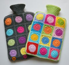 two crocheted pot holders are sitting next to each other