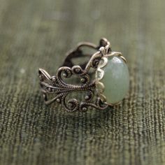 Filigree Vintage Handmade Ring Jewelry, Handmade Vintage Ring Jewelry, Vintage Bronze Handmade Rings, Handmade Vintage Style Ring, Vintage Brass Jewelry In Antique Silver, Handmade Victorian Metal Rings, Vintage Brass Open Ring Jewelry, Handmade Antique Silver Vintage Rings, Handmade Vintage Antique Silver Rings