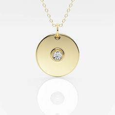 Featuring our Defining Diamond Medal, give your jewelry collection the Midas touch with this beautiful 14K gold round pendant. Embellished with a central lab grown diamond, this gold pendant will add the perfect amount of lustre to your look. Simple yet striking, this round gold pendant can be styled on its own or layered with daintier styles. 14k Gold Jewelry With Diamond Accents Round Pendant, Elegant 14k Gold Pendant Medallion Necklace, 14k Gold Round Pendant Diamond Necklace With Polished Finish, Yellow Gold Round Pendant Necklace, Fine Jewelry, 14k Gold Round Pendant Diamond Necklace, Tarnish Resistant, Minimal Pendant, Pearl And Diamond Earrings, Solitaire Necklaces, Elegant Necklaces