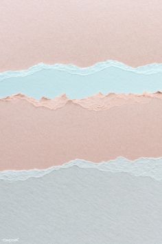 an image of torn paper with pastel blue and light pink stripes on it's edges