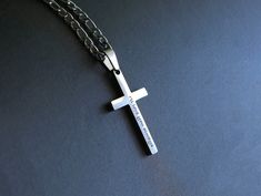 Personalized Cross Necklace - Custom Engraved Men's and Boys Cross Necklace Add a touch of elegance and sentimentality to your jewelry collection with our Personalized Cross Necklace. This beautifully crafted piece is perfect for men and boys, making it a versatile accessory for any occasion. Whether you're looking for a meaningful gift for a loved one or a special treat for yourself, this engraved cross necklace is sure to make a lasting impression. Key Features: Custom Engraving: Personalize t Father's Day Stainless Steel Cross Pendant Necklace, Engraved Stainless Steel Cross Necklaces, Spiritual Sterling Silver Jewelry With Engraved Text, Silver Engraved Text Pendant Necklace, Inspirational Silver Jewelry For Father's Day, Spiritual Stainless Steel Necklaces For Father's Day, Spiritual Stainless Steel Necklace For Father's Day, Silver Pendant Necklace With Engraved Text, Memorial Pendant Jewelry For Father's Day