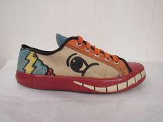 "Vintage 1960s multi color pop art shoes, canvas sneakers. Designed by Peter Max. All original with original laces. Made by Randy. Size 5. Actual measurements are: 10 1/4\" toe to heel across the soles 3 5/8\" across the soles widest point (ball of the foot) In very good condition with some color spots on the insoles." Low-top Canvas Shoes With Graphic Print, Retro Custom Sneakers For Streetwear, Retro Low-top Custom Sneakers With Gum Sole, Retro Low-top Custom Sneakers With Rubber Sole, Retro Canvas Shoes With Vulcanized Sole, Retro Multicolor Sneakers With Gum Sole, Vintage Low-top Custom Sneakers With Gum Sole, Retro Multicolor Low-top Custom Sneakers, Retro Style Custom Multicolor Sneakers With Rubber Sole