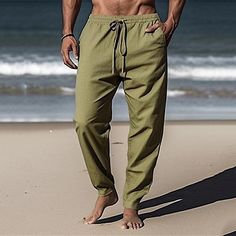 Category:WE-Pants; Season:Spring  Summer; Fabric:80% Cotton; Gender:Men's; Style:Hawaiian,Boho; Occasion:Beach,Daily,Holiday,Vacation; Fit Type:Regular Fit; Function:Comfort,Breathable; Waistline:Mid Waist; Pattern:Plain; Design:Elastic Waist,Drawstring,Pocket; Pants Type:Summer Pants,Linen Pants,Beach Pants,Trousers; Fly Type:Elasticity; Front page:FF; Listing Date:03/14/2024; Production mode:External procurement; Hips:; Length:; Waist: Green Full-length Beach Pants, Men’s Linen Pants Style, Non-stretch Beach Pants With Pockets, Beach Wide-leg Pants With Drawstring, Men’s Linen Trousers, Linen Beach Pants, Beach Fit, Mens Linen Pants, Pants Pocket