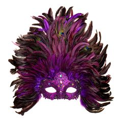 a purple mask with feathers on it