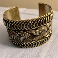 Braided Gold Tone Design Cuff Bracelet, Excellent Condition With Original Price Tags Still On Trendy Metal Cuff Bracelet, Adjustable Metal Braided Bangle Bracelet, Adjustable Nickel Free Trendy Cuff Bracelet, Trendy Adjustable Nickel-free Cuff Bracelet, Trendy Nickel-free Adjustable Cuff Bracelet, Trendy Adjustable Metal Cuff Bracelet, Trendy Adjustable Brass Bracelets, Trendy Handmade Gold Cuff Bracelet, Gold Handmade Trendy Cuff Bracelet