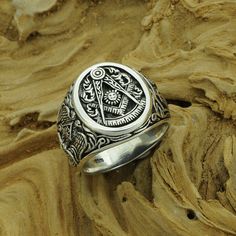 "Beldiamo 10 g Sterling Silver Past Master Masonic Symbol Ring Big Signet Freemacon Ring Gift Men Masonic Gift Jewelry * 100% polished solid sterling silver * .925 trademark stamp * Solid sterling silver weight: approx. 10 Grams, depending on the size of the ring * Measurement of ring face : 18 mm / 0.39 in x 15 mm / 0.59 in * Crafted and polished by hand * R0206-GJ-10 Fact Past Master Masonic Symbol-The Compass, Square, Sun, and Quadrant in the world. his symbol includes the Square as a reminde Symbolic Formal Jewelry With Etched Details, Formal Symbolic Etched Jewelry, Symbolic Nickel-free Oval Jewelry, Symbolic Oval Nickel-free Jewelry, Nickel-free Oval Symbolic Jewelry, Symbolic Intricate Design Jewelry For Anniversary, Heirloom Style Adjustable Sterling Silver Jewelry, Adjustable Silver Etched Signet Ring, Adjustable Etched Silver Signet Ring