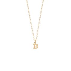 Our mini gold initial necklace features a tiny gold uppercase letter that hangs along a delicate 14kt gold filled chain. Looks gorgeous on and is the most adorable, mini size! It's the perfect gift for a new mom, best friend, bridesmaids or even something special just for you!DETAILS: 14kt gold filled chain + clasp 14kt gold filled charm Choose length, model wearing 18 inches Worn layered with our Lace Choker, see it here. 14k Gold Filled Initial Pendant Charm Necklace, Dainty Yellow Gold Monogram Charm Necklace, Personalized Yellow Gold Initial Necklace With Delicate Chain, Dainty Yellow Gold Initial Necklace For Personalized Gift, Dainty 14k Gold Initial Necklace For Personalized Gift, Dainty 14k Gold Filled Initials Charm Necklaces, Personalized 14k Gold Filled Initial Necklace, Personalized Dainty Yellow Gold Initial Necklace, Dainty 14k Gold Filled Initials Charm Necklace