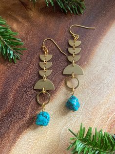 18k gold plated, nickel free earrings with turquoise and brass. Nickel-free 14k Gold-filled Gold-tone Jewelry, Brass Wire Wrapped Dangle Earrings, Wire Wrapped Brass Dangle Earrings, Handmade Turquoise Metal Chandelier Earrings, Bohemian Blue 14k Gold-filled Jewelry, Blue Bohemian 14k Gold Filled Jewelry, Bohemian Blue 14k Gold Filled Jewelry, Nickel-free Turquoise Copper Jewelry, Blue Brass Dangle Earrings