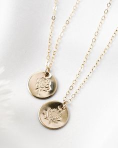 · 1/2" (12.7mm) disc· 14k yellow gold fill, 14k rose gold fill, and sterling silver options· Sturdy, timeless, and built to be worn everydayOur classic 1/2” necklaces are easy to layer, elegant, and ready to be personalized with your most special sentiments, moments, and memories! Created to last a lifetime, these necklaces will remain evergreen even as the years and trends come and go.Personalizing your piece with a message? Reference our fonts and symbols chart for font options and character m Everyday Rose Gold Jewelry With Birth Flower, Dainty 14k Gold Filled Engraved Charm Necklace, Dainty Engraved 14k Gold Filled Charm Necklaces, Tarnish Resistant 14k Gold Filled Necklace With Round Pendant, Minimalist Rose Gold Birth Flower Jewelry, Rose Gold Minimalist Birth Flower Jewelry, 14k Gold Birth Flower Jewelry For Mom, Rose Gold 14k Birth Flower Jewelry, Everyday Birth Flower Pendant Jewelry