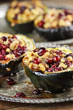 baked desserts with cranberries and walnuts on a plate