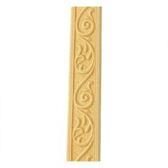 an ornate gold bookmark on a white background