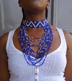 Blue and White Necklace, African Beaded Necklace, African Jewelry, Necklace for Women, Tribal Necklace, Gift For herThis beaded necklace is superbly crafted which can be worn with any outfit at different occasions.Main color - Blue and white.The necklace can be available in different colors.Wholesale available at a fair price,please contact me.For any clarification,please send me a convo or an e-mail.Thank you for visiting and happy shopping!!.. Blue Multi-strand Jewelry With Dangling Beads, Blue Beaded Chain Choker, Elegant Blue Beaded Choker, Blue Multi-strand Beaded Necklace With Dangling Beads, Adjustable Blue Multi-strand Beaded Necklace, Elegant Blue Choker With Colorful Beads, Blue Jewelry With Dangling Round Beads, Blue Multi-strand Beaded Jewelry, Blue Beaded Multi-strand Jewelry