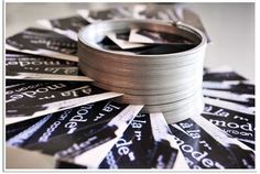 several stacks of black and white cards stacked on top of each other