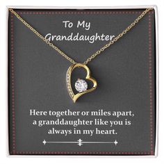 To My GranddaughterHere together or miles apart, a granddaughter like you is always in my heart.The dazzling Forever Love Necklace is sure to make her heart melt! This necklace features a stunning 6.5mm CZ crystal surrounded by a polished heart pendant embellished with smaller crystals to add extra sparkle and shine. Beautifully crafted with either a white gold or yellow gold finish, be sure to give her a classic gift she can enjoy everyday. 14k white gold finish or 18k yellow gold finish 6.5mm Meaningful Jewelry Gift For Mom On Valentine's Day, Open Heart Necklace With Hallmark For Anniversary, Meaningful Hallmarked Jewelry For Valentine's Day, Meaningful Yellow Gold Jewelry For Anniversary, Certified Open Heart Anniversary Necklace, Meaningful Hallmark Jewelry For Valentine's Day, Meaningful Jewelry For Anniversary And Valentine's Day, Open Heart Jewelry For Birthday And Mother's Day, Meaningful Jewelry For Anniversary On Valentine's Day