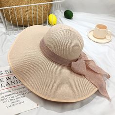 Elevate your summer style with our Summer Seaside Brimmed Straw Hat. This elegant sun hat combines casual elegance with practical design, making it perfect for outdoor activities. Crafted from high-quality paper straw, it offers a lightweight and breathable fit. The solid pattern and wide brim provide excellent sun protection, while the multifunctional design ensures versatility for any occasion. Ideal for beach outings, picnics, and casual gatherings, this hat keeps you stylish and protected un Beach Straw Hat, French Hat, Womens Beach Hat, Handkerchief Men, Big Hat, Baby Hair Clips, Pullover Windbreaker, Beach Hat, Woman Beach