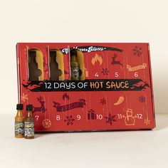 the 12 days of hot sauce gift set includes four bottles