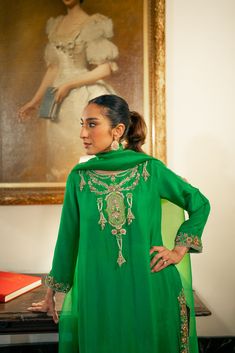 3 piece suit comes with matching pants, and dupatta. Shirt length: 45 inches The shirt and pants are made of pure raw silk and the dupatta is organza. This item includes the following handwork: aari, kora, and zardozi with pearls, sequins, and resham thread. This outfit including the sleeves is not see through. Orders cannot be changed or cancelled after 30 minutes of completion of the order. We do not offer returns or exchanges on this item. We cannot make any exceptions to this policy since th Transitional Designer Silk Palazzo Set, Silk Palazzo Set With Resham Embroidery For Diwali, Traditional Tissue Silk Palazzo Set With Zari Work, Transitional Tissue Silk Kurta With Dupatta, Straight Kurta With Dupatta In Tissue Silk, Semi-stitched Tissue Silk Palazzo Set With Zari Work, Bollywood Style Tissue Silk Palazzo Set With Zari Work, Tissue Silk Palazzo Set With Traditional Drape For Eid, Eid Tissue Silk Palazzo Set With Traditional Drape