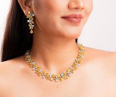 Canary yellow diamond necklace featuring yellow stones and cz diamonds. Perfect for any special occasion look or bride wedding look. It will enhance your look and add a touch of luxury ness in your look. *𝐏𝐑𝐎𝐃𝐔𝐂𝐓 𝐃𝐄𝐓𝐀𝐈𝐋* * 𝐌𝐚𝐭𝐞𝐫𝐢𝐚𝐥: Brass * 𝐏𝐥𝐚𝐭𝐢𝐧𝐠: White Rhodium Plated * 𝐒𝐭𝐨𝐧𝐞: AAA-quality CZ Diamond & Canary. *𝐃𝐈𝐌𝐄𝐍𝐒𝐈𝐎𝐍𝐒* *𝐍𝐞𝐜𝐤𝐥𝐚𝐜𝐞* * 𝐖𝐞𝐢𝐠𝐡𝐭: 83 gm  * 𝐃𝐫𝐨𝐩 𝐋𝐞𝐧𝐠𝐭𝐡: 5.5 Inches * 𝐖𝐢𝐝𝐭𝐡:  0.7 Inches *𝐄𝐚𝐫𝐫𝐢𝐧𝐠𝐬* * 𝐖𝐞𝐢 Elegant Yellow Bridal Necklace For Party, Yellow Diamond Jewelry With Single Cut Diamonds, Elegant Yellow Diamond Necklace For Anniversary, Wedding Yellow Gold Diamond Necklace With Sparkling Stones, Formal Yellow Diamond Necklace, Formal Yellow Jewelry With Single Cut Diamonds, Luxury Yellow Jewelry For Wedding, Elegant Yellow Bridal Necklace For Formal Occasions, Luxury Yellow Wedding Jewelry