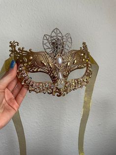 Handmade golden carnival party with rhinestones mask unisex venetian mask A unique item for Carnival party or Halloween party! Golden Mask  The mask is unisex. The base is plastic, decorated with rhinestone chain, rhinestones. One size. Handmade. Unique. Tied behind the head with satin ribbon. Decor does not interfere with the view. Perfect for a carnival party, birthday party, Pride or photoshoot. CHIMERA - IT IS ALWAYS BEAUTIFUL PACKAGING🎁 SO IT CAN BE A GOOD GIFT FOR AN IMPORTANT PERSON❤️🔥 Rhinestones Mask, Crown Mask, Mascarade Party, Golden Mask, Ribbon Decor, Costume Masks, Venetian Mask, Rhinestone Chain, Handmade Fashion Jewelry